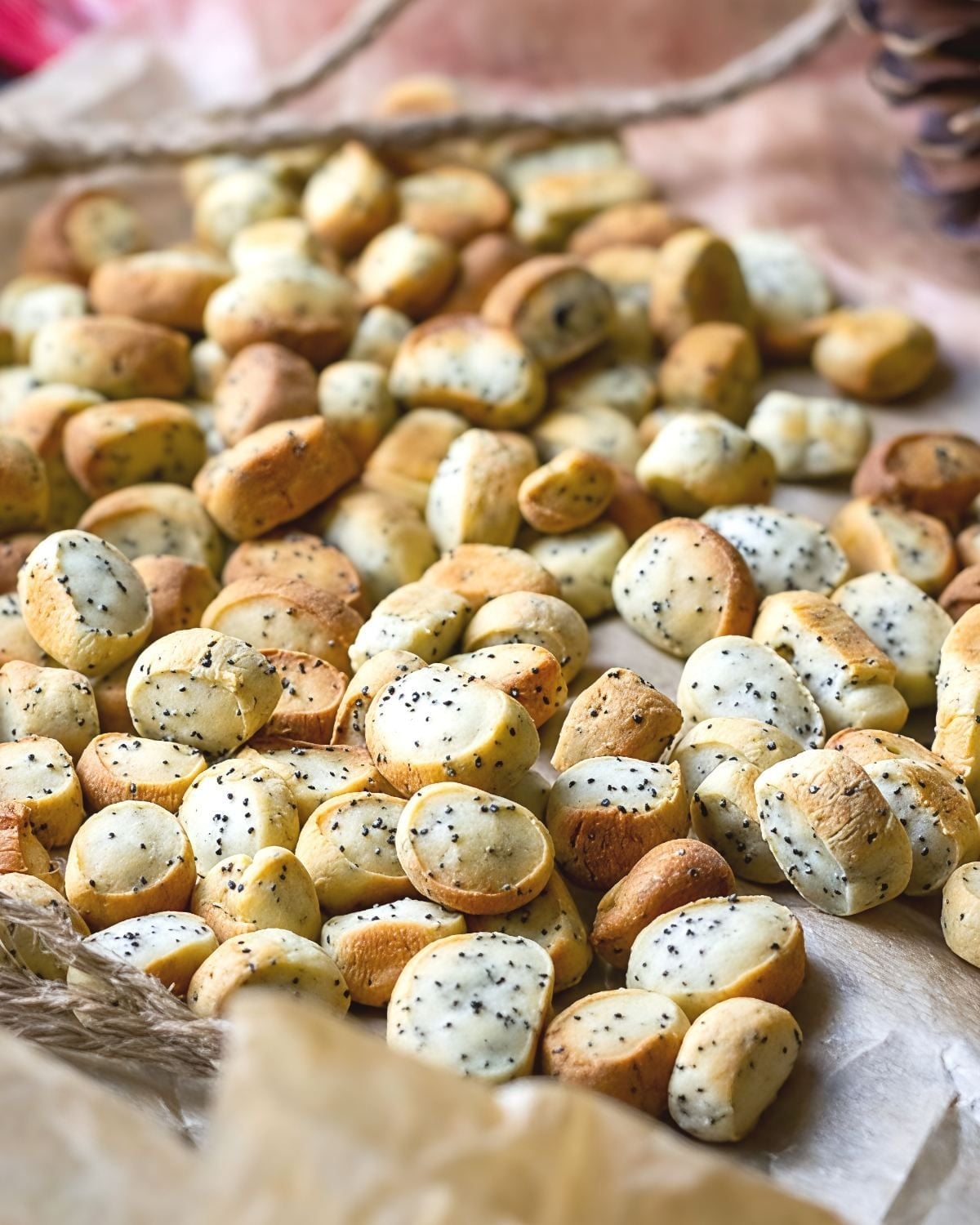 A cluster of small, bite-sized Lithuanian Kūčiukai poppy seed pastries served as a traditional European Christmas dessert.