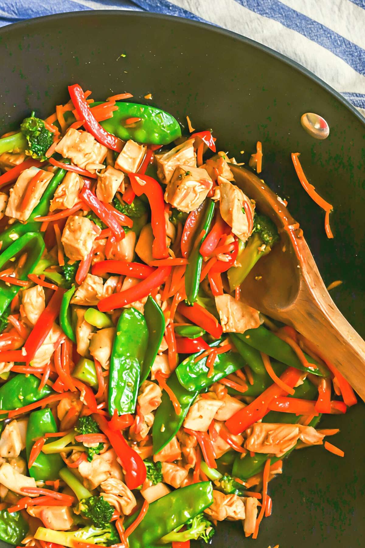 Fresh leftover turkey breast stir-fry tossed with vibrant mixed vegetables in a skillet.